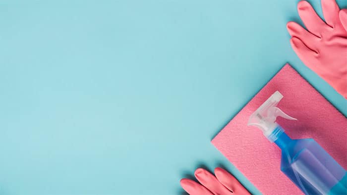 blue background with cleaning tools
